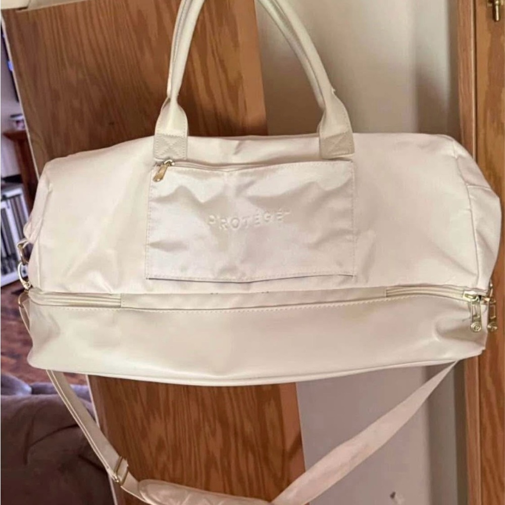 Cream Duffel Bag